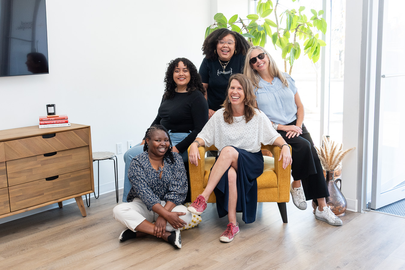 boutique team group photo of 5 women during brand photoshoot with Dandelion Digital at CO+ in Dartmouth, NS