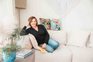 sitting on couch for branding photo for her business