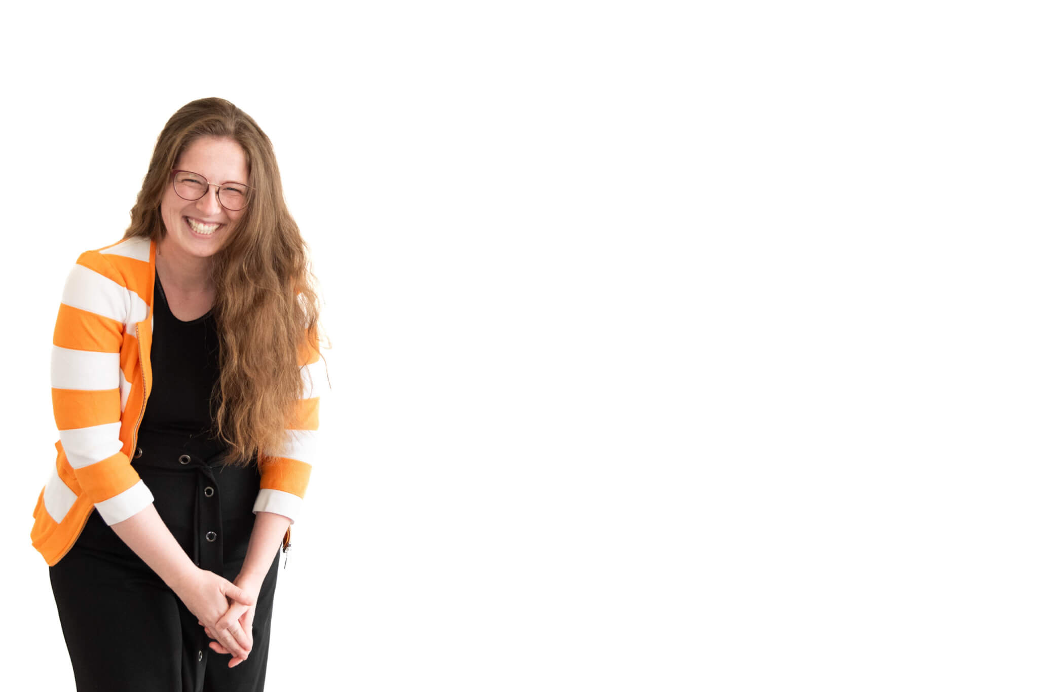 creative headshot of female with long hair and a yellow striped sweater