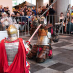 2 knights in duel with crowd watching at Hal-Con