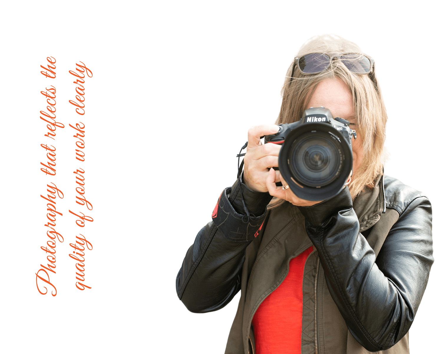 Halifax female photographer holding a Nikon camera to her eye, representing Dandelion Digital's brand and event photography services