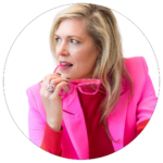 blond woman in a hot pink jacket, looking to the side with the tip of pink glasses in her teeth